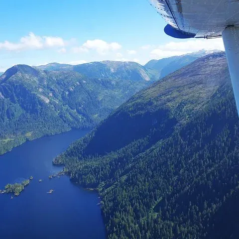 A lake among forested ridges